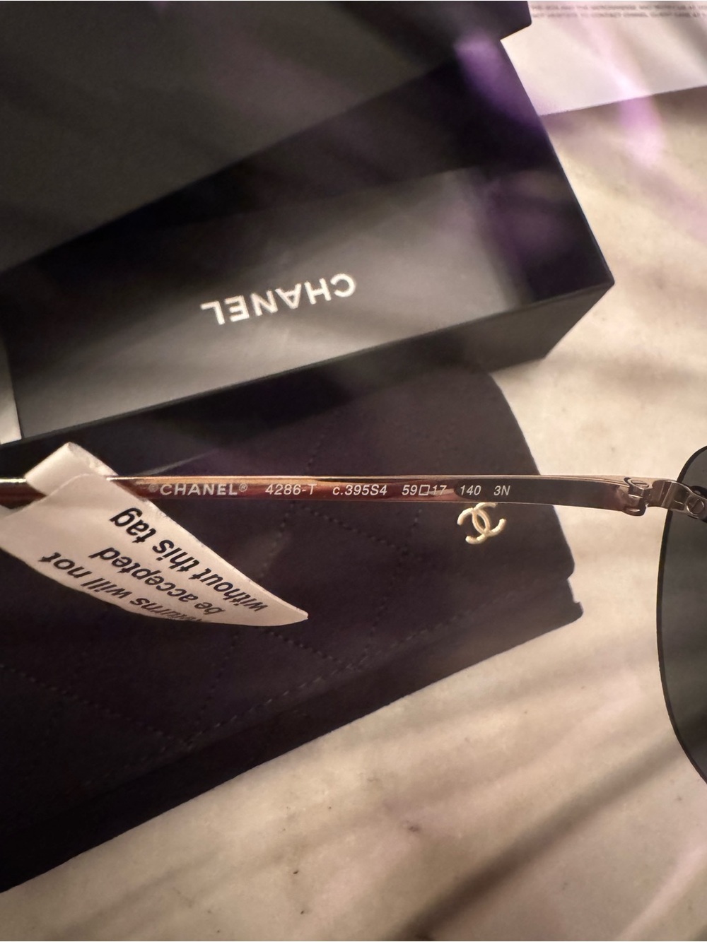 CHANEL Black Rimless Cat-Eye Sunglasses with Gold Accents - Picture 5 of 12